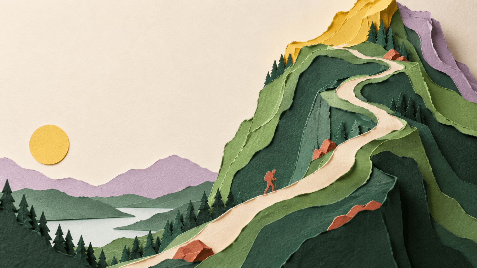 Montagne en papier découpé traversée par un sentier